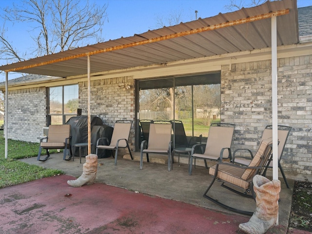 view of patio with a grill