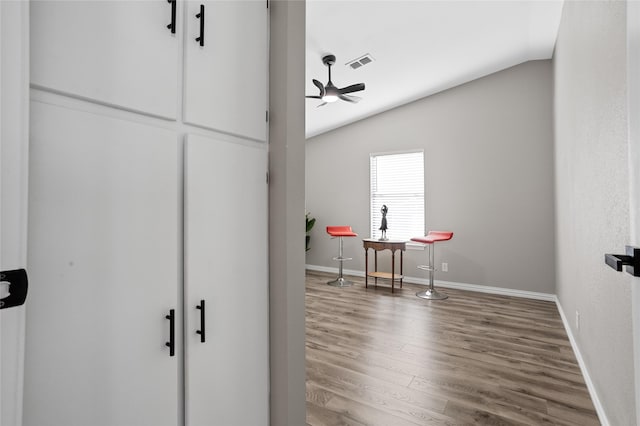 interior details with ceiling fan and wood-type flooring