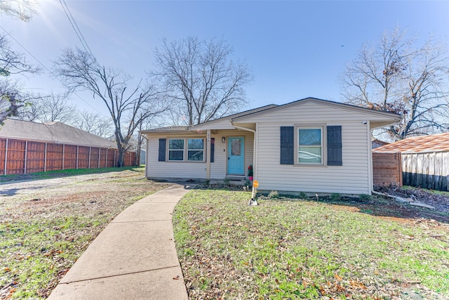 view of front of home with a front lawn