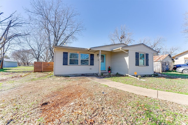 view of front of property with a front lawn