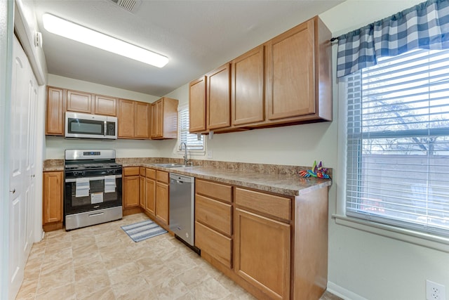 kitchen featuring sink and stainless steel appliances