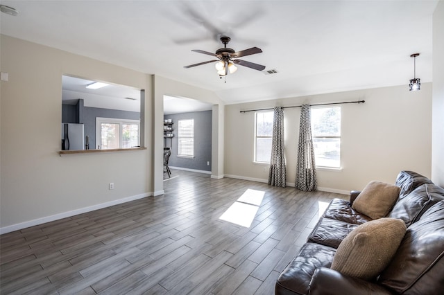 living room featuring ceiling fan