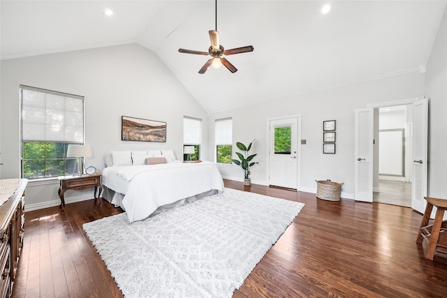 bedroom with multiple windows, ceiling fan, and dark wood-type flooring