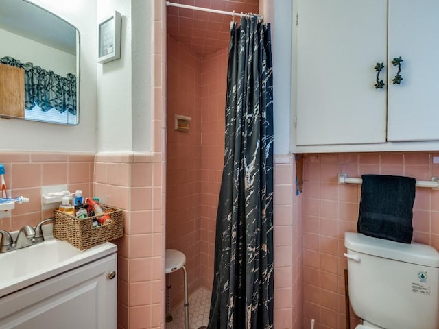 bathroom with toilet, walk in shower, and tile walls