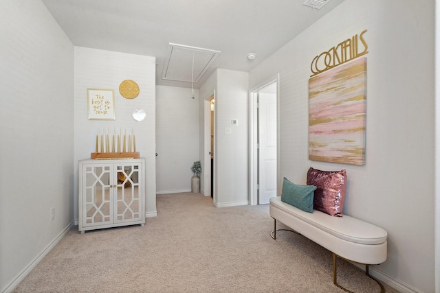 sitting room with light colored carpet