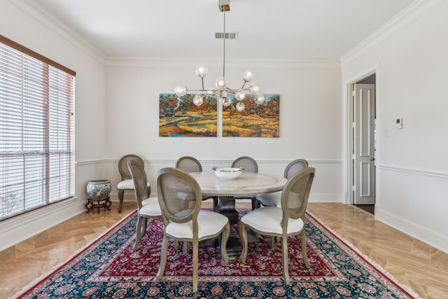 dining area featuring an inviting chandelier, visible vents, crown molding, and baseboards