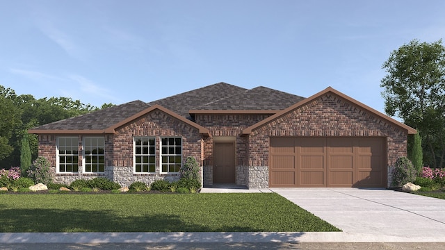 view of front of house with a garage and a front lawn