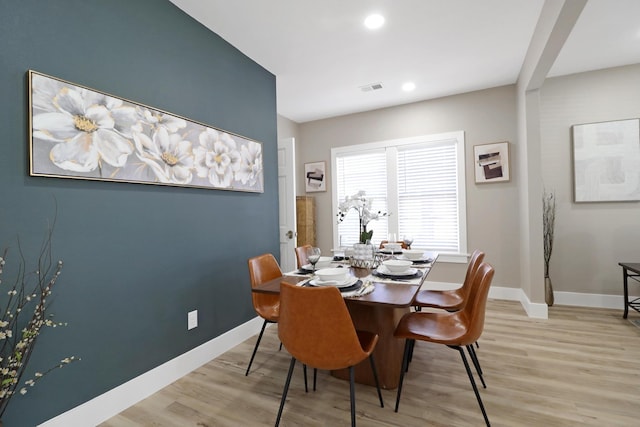 dining room with light hardwood / wood-style floors