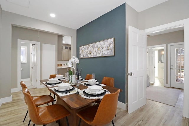 dining room with light hardwood / wood-style floors