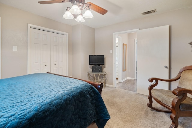 bedroom featuring carpet, a closet, and ceiling fan