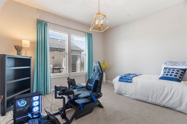 carpeted bedroom with a chandelier