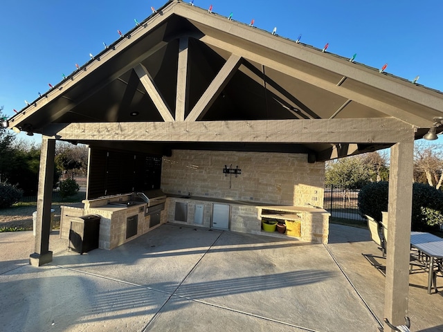 view of patio featuring a gazebo and area for grilling