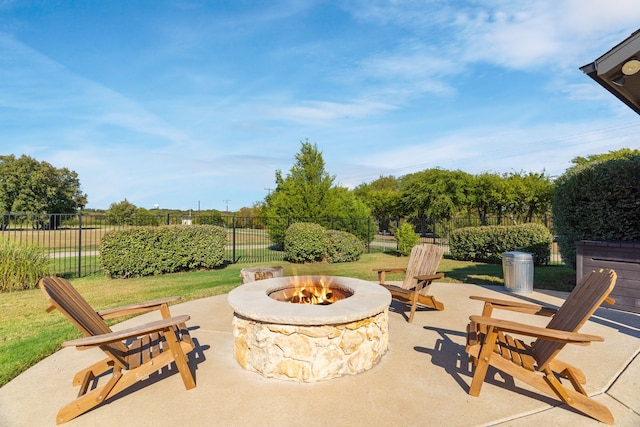 view of patio with an outdoor fire pit