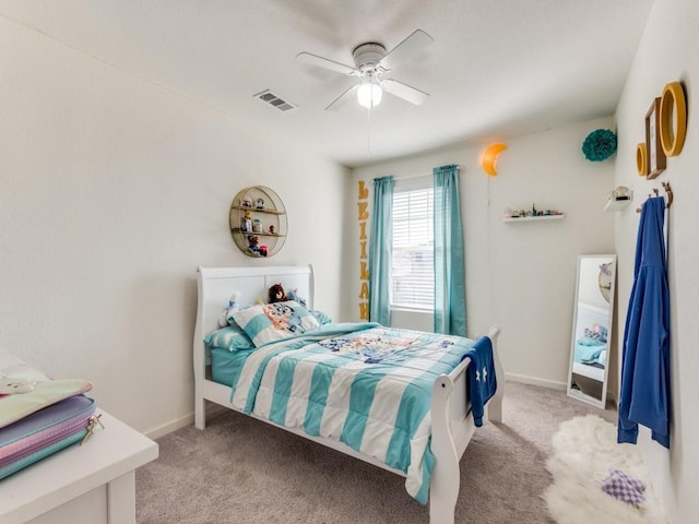 carpeted bedroom with ceiling fan