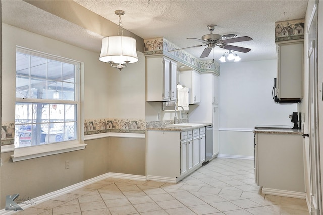 kitchen featuring ceiling fan, dishwasher, white cabinets, and pendant lighting