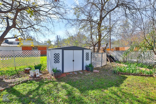 view of outdoor structure featuring a lawn