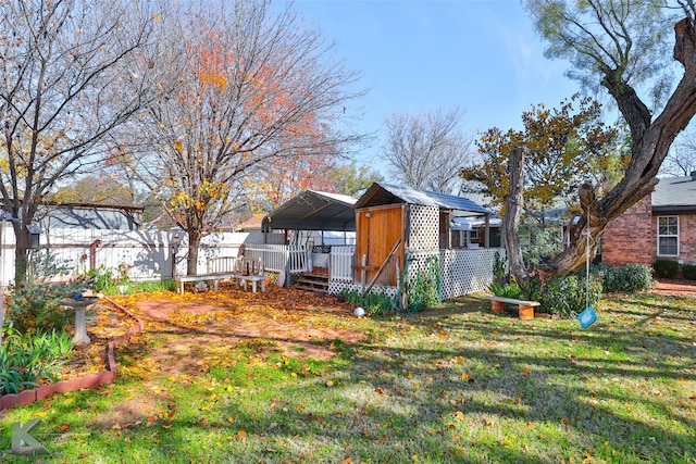 view of yard featuring a carport