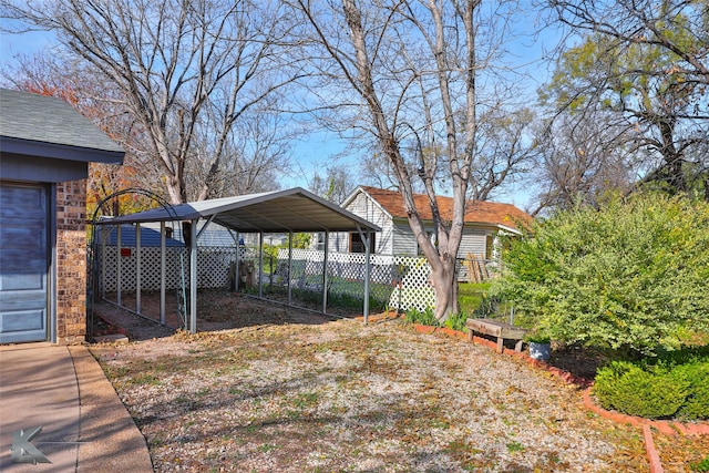 view of yard featuring a carport