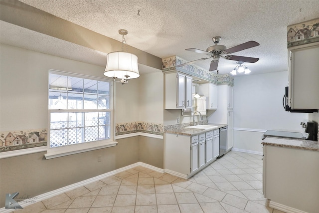 kitchen with stove, ceiling fan, pendant lighting, dishwasher, and white cabinetry