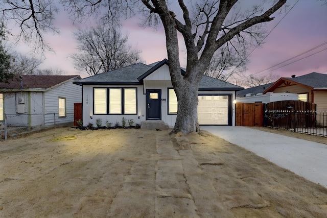 view of front of home with a garage