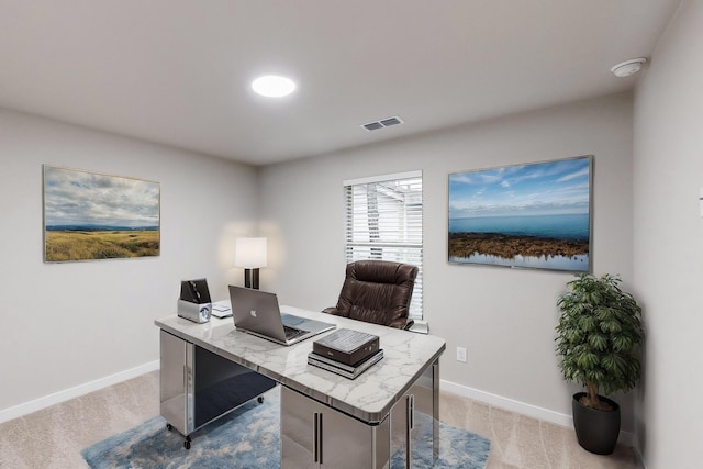 home office with light colored carpet