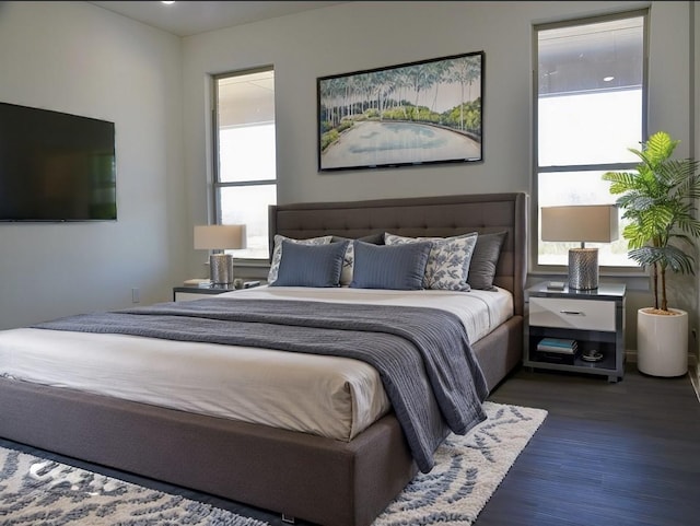 bedroom featuring wood finished floors