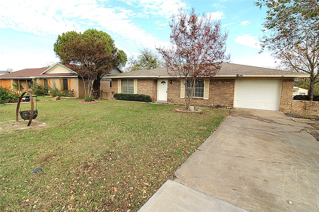 ranch-style home with a garage and a front yard