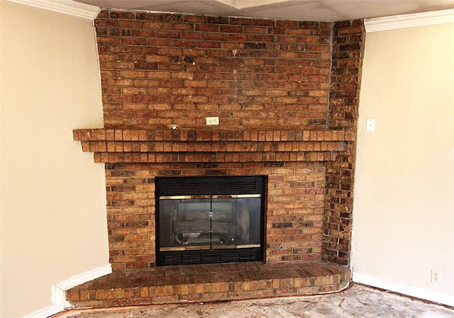 interior details featuring crown molding and a fireplace