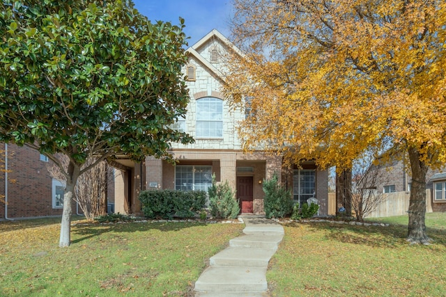 view of front of home featuring a front lawn