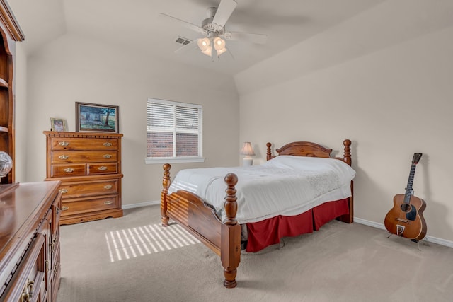 carpeted bedroom featuring vaulted ceiling and ceiling fan