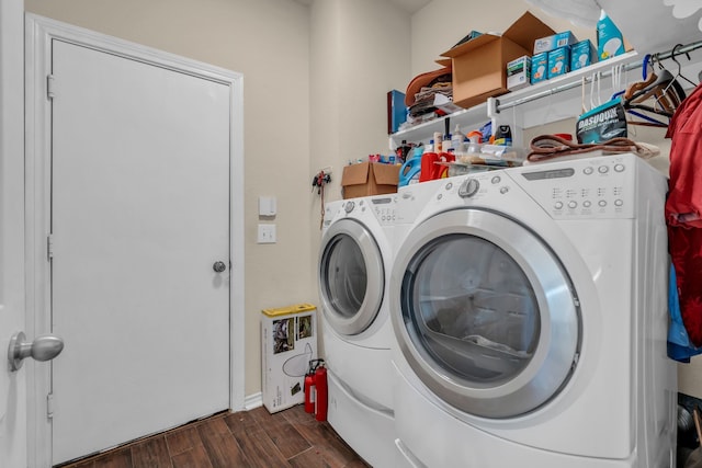 laundry room featuring dark wood-type flooring and washing machine and dryer