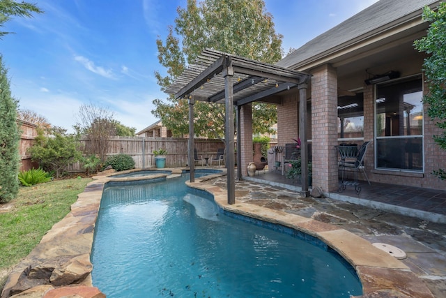 view of swimming pool featuring an in ground hot tub, a patio area, and a pergola