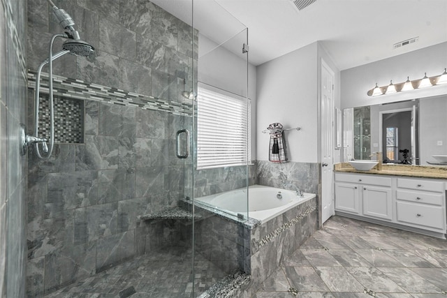 bathroom featuring vanity and plus walk in shower