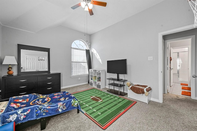 carpeted bedroom featuring vaulted ceiling and ceiling fan