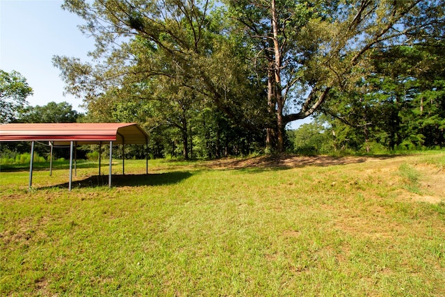 view of yard with a carport