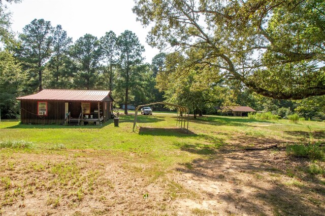 view of yard featuring a porch