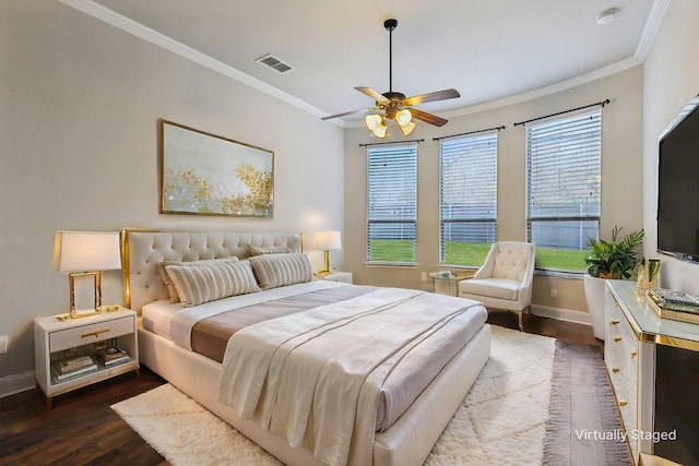 bedroom featuring ceiling fan, dark hardwood / wood-style flooring, and ornamental molding