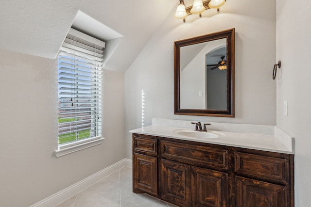 bathroom with tile patterned flooring, ceiling fan, and vanity