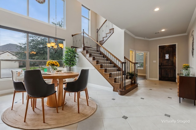 dining room featuring a chandelier and ornamental molding