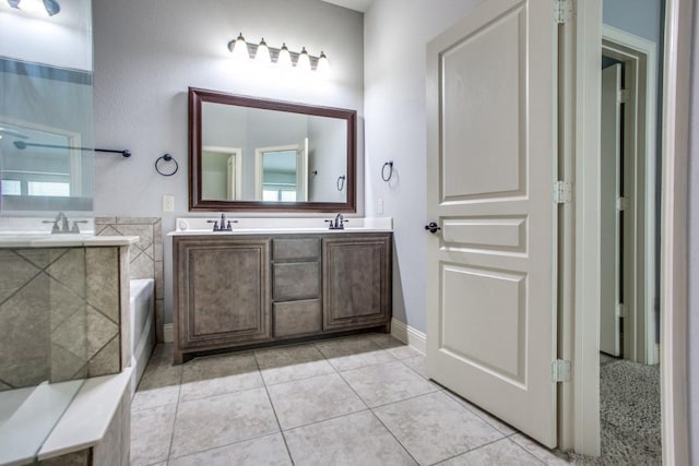 bathroom with vanity and tile patterned floors