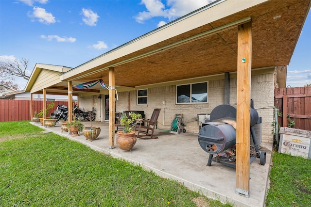 exterior space featuring a yard and a patio area