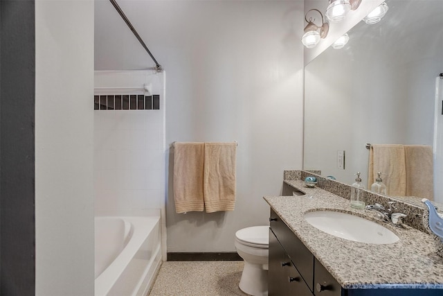 full bathroom with tiled shower / bath combo, vanity, and toilet