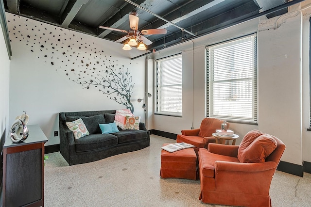 living room featuring ceiling fan