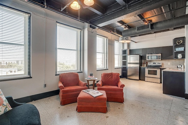 living room featuring sink