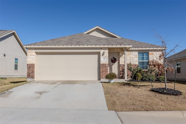 ranch-style home featuring a garage