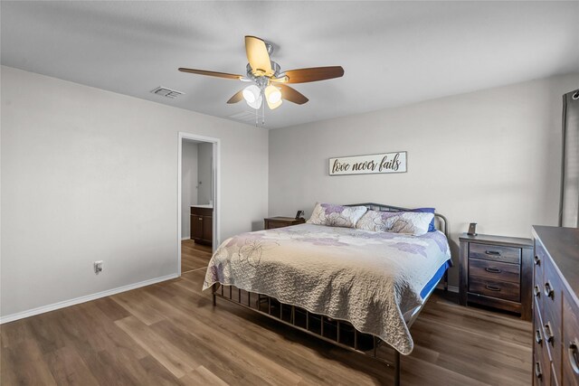 bathroom with hardwood / wood-style flooring, vanity, toilet, and a shower with shower curtain