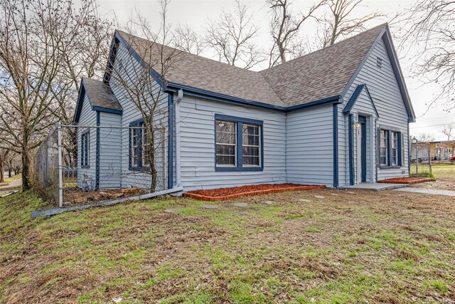 view of property exterior featuring a yard