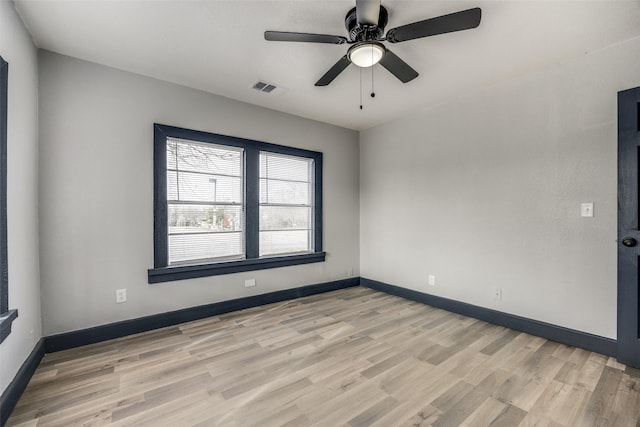 unfurnished room with ceiling fan and light hardwood / wood-style floors