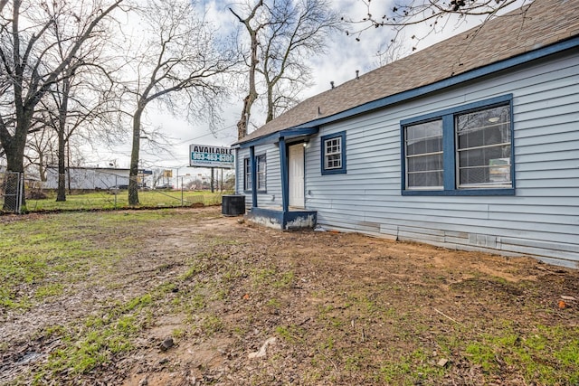 view of yard with central AC