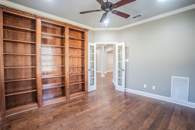 interior space with french doors, dark wood-type flooring, ceiling fan, and ornamental molding